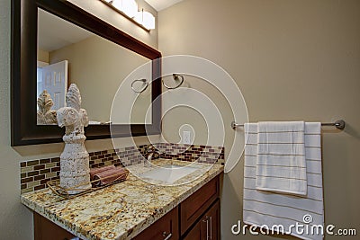 Elegant bathroom with a mahogany stained vanity Stock Photo