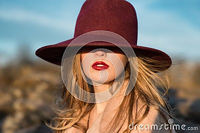 Elegant beautiful woman with red lips and hat Stock Photo