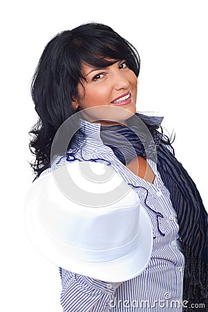 Elegant businesswoman holding white hat Stock Photo