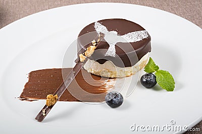 Elegant chocolate souffle cake served with berries Stock Photo