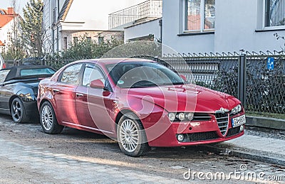 Elegant classic red Alfa Romeo 159 parked Editorial Stock Photo