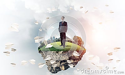 Confident boss and modern city as concept of eco green construct Stock Photo