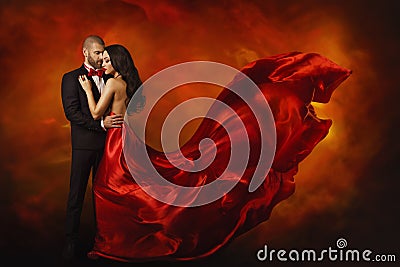 Elegant Couple, Dancing Woman in Red Dress with Man Stock Photo