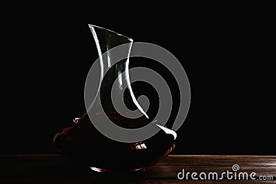 Elegant decanter with red wine on table Stock Photo