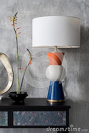 Elegant and decorative lamp on console table Stock Photo