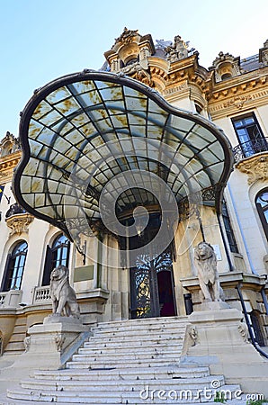 Elegant entrance guarded by sculpted lions Stock Photo