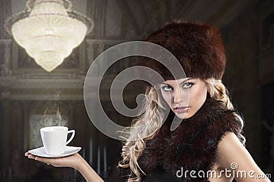 Elegant fashion lady with cup of tea Stock Photo