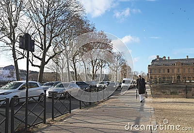 Elegant French man walking on the Champs Elysees in Paris France. 20.10.2018 Editorial Stock Photo