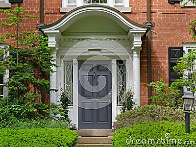 Elegant front door with portico Stock Photo