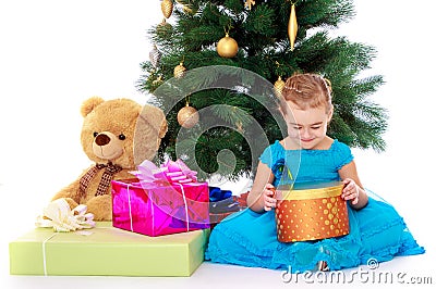 Elegant girl near the Christmas tree Stock Photo