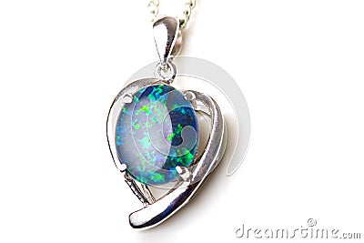 Elegant jewelry opal stone silver pendant heart Stock Photo