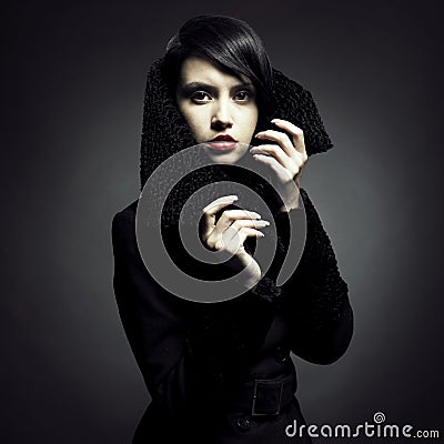 Elegant lady in coat Stock Photo