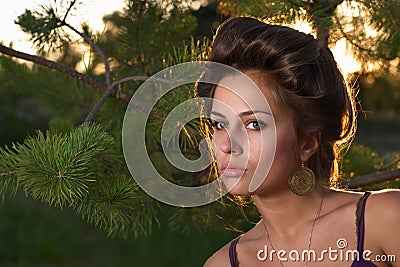 Elegant lady in forest Stock Photo