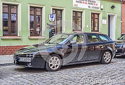 Elegant luxury hatchback car Alfa Romeo 159 parked Editorial Stock Photo