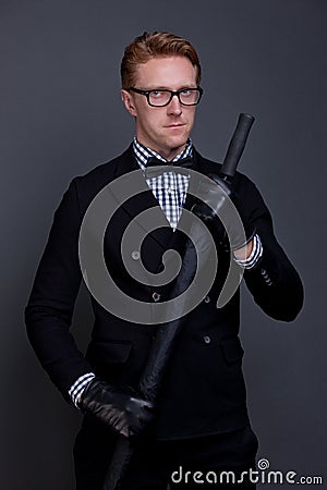 Elegant man with a bow and an umbrella Stock Photo