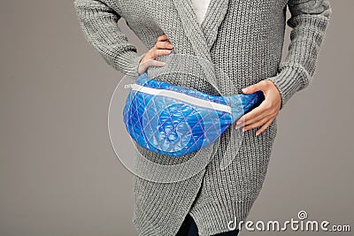 Elegant model with a fanny pack. Closeup picture Stock Photo