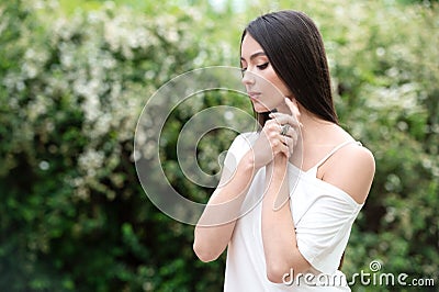 Elegant model poses for the spring catalog of jewelry and accessories Stock Photo