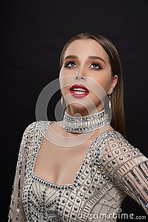 Elegant model posing in glam beaded dress. Stock Photo