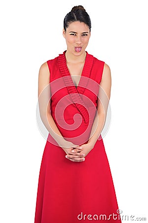 https://thumbs.dreamstime.com/x/elegant-model-rode-kleding-die-haar-tong-uit-plakken-33188816.jpg