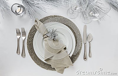 Elegant New Year`s Eve or Christmas holiday place setting. Fine dining table decor. Stock Photo