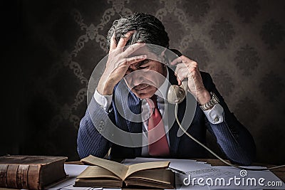 Elegant rich businessman phoning Stock Photo