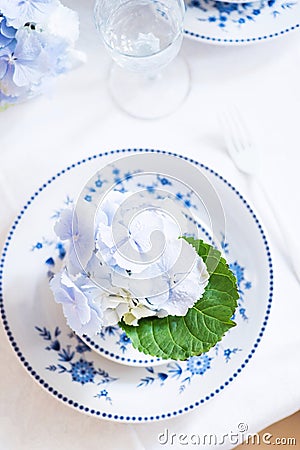 Elegant table setting with flowers Stock Photo