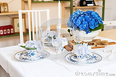 Elegant table setting with flowers Stock Photo