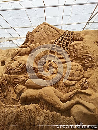 Elegant and tempted image of sand sculpture about acquarium lifes Editorial Stock Photo