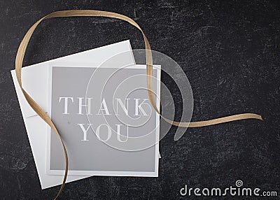 Elegant thank you note with gray and black with white from above Stock Photo