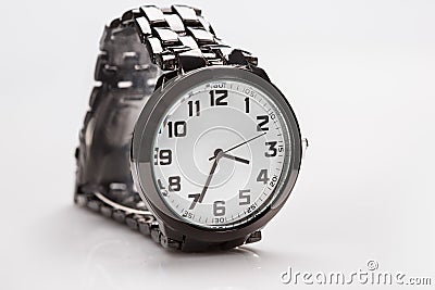 Elegant watch with a metal bracelet Stock Photo