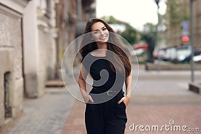 Elegant woman in black dress Stock Photo