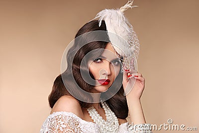 Elegant woman portrait in retro hat. Beautiful girl wears in pea Stock Photo