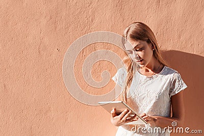 Elegant young woman using tablet Stock Photo