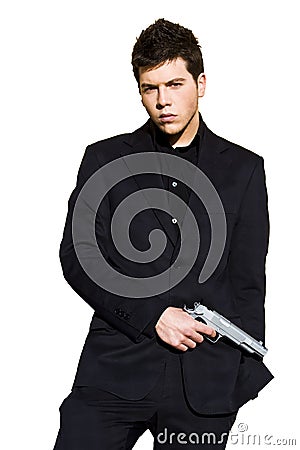 Elegantly dressed armed man. Stock Photo