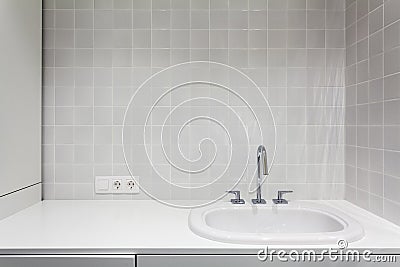 Element of bathroom interior. New wash basin, white sink and tile Stock Photo