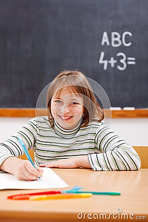 Elementary school girl practicing Stock Photo