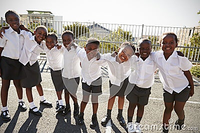 Elementary school kids in Africa posing in school playground Stock Photo