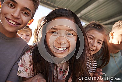 Elementary school kids smiling to camera, close up Stock Photo