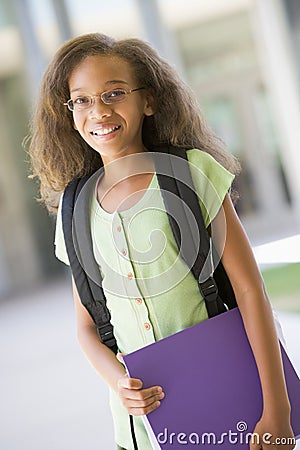 Elementary school pupil outside Stock Photo