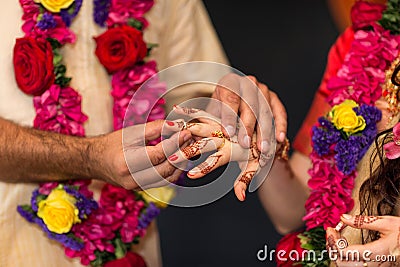 Elements of Vedic wedding wearing rings close up Stock Photo