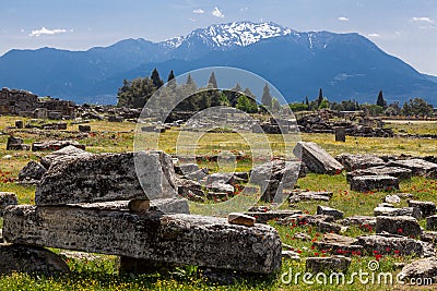 The elements of the wall of a ruined ancient house. Beautiful background of the ruins of Greek cities. Stock Photo