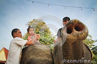 Elephant carries children Editorial Stock Photo