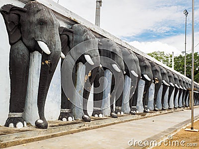 Elephant sculptures at the wall of Sri Lankan stupa Stock Photo