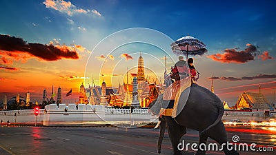 An Elephant with Tourists at Wat Phra Kaew in the Grand Palace of Thailand in Bangkok Stock Photo