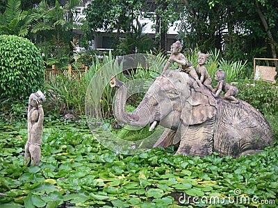 Elephant water stone sculpture indonesia bali Stock Photo