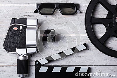 Elevated View Of Movie Camera, Film Reel And Clapper Board Stock Photo