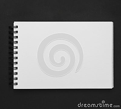 Elevated view spiral notepad black background. High quality and resolution beautiful photo concept Stock Photo