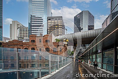 Elevated walkway from Wynyard Station to Barangaroo amidst modern skyscappers in Sydney, Australia Editorial Stock Photo