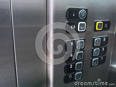 Elevator lift buttons, modern stainless steel interior. Stock Photo