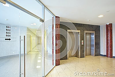 The elevator lift hall and a transparent door Stock Photo